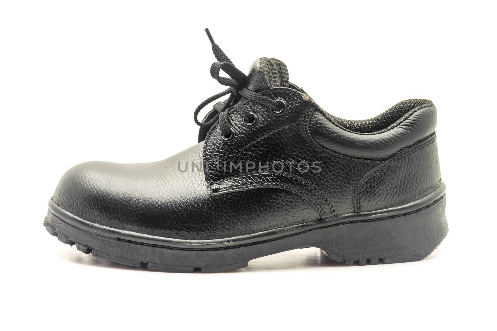 Protective workwear black safety shoes on white background.