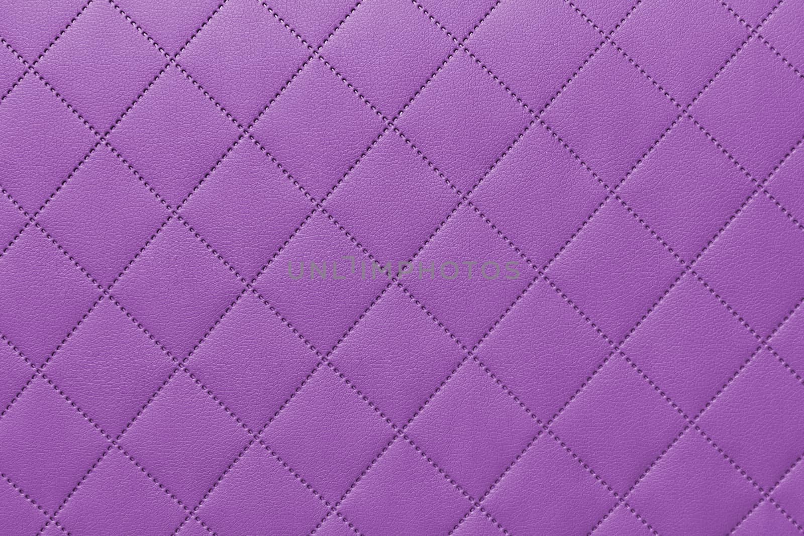 detail of sewn leather, purple leather upholstery background pattern