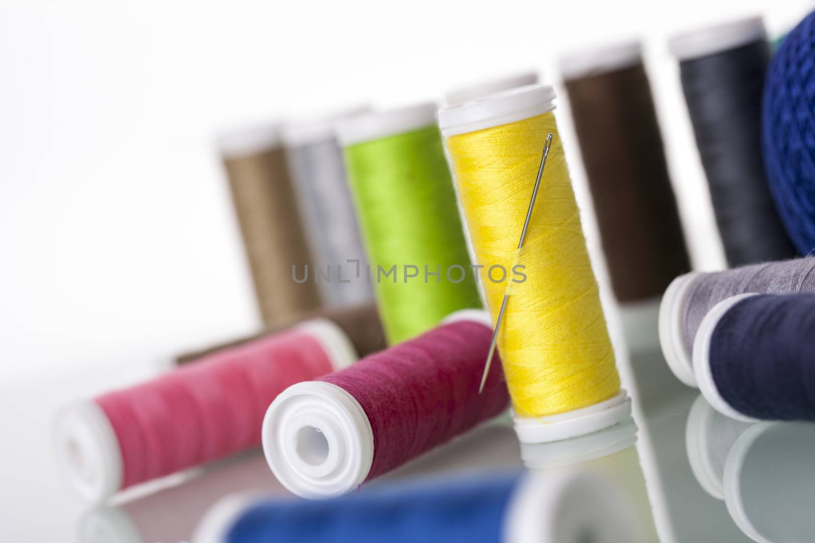 Sewing threads isolated on white background. Studio Shot