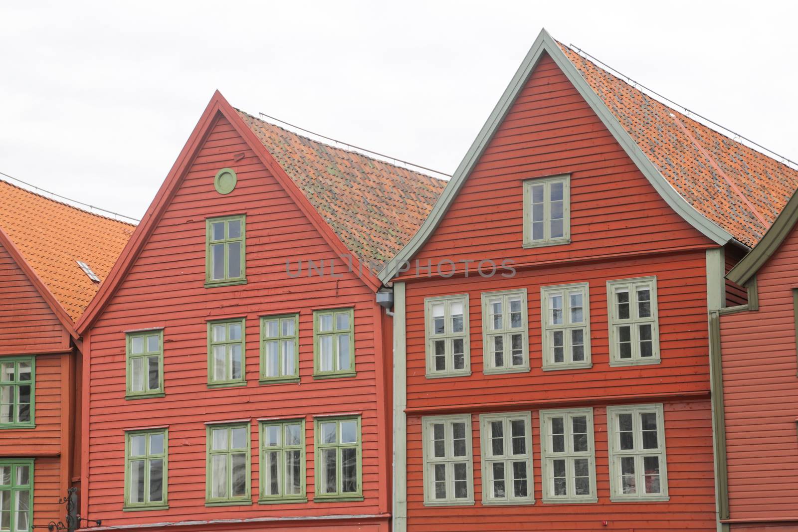 Famous Bryggen street with wooden colored houses in Bergen