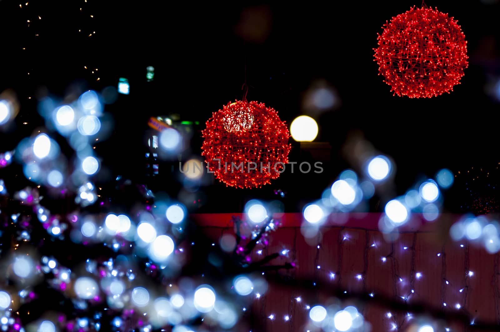 Red bright balls with white foreground lights by vangelis