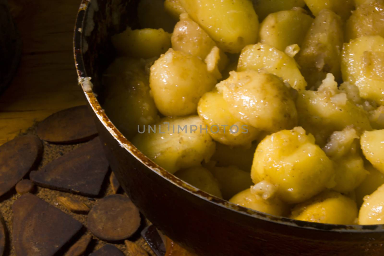 Fried potatoes in a frying pan by VIPDesignUSA