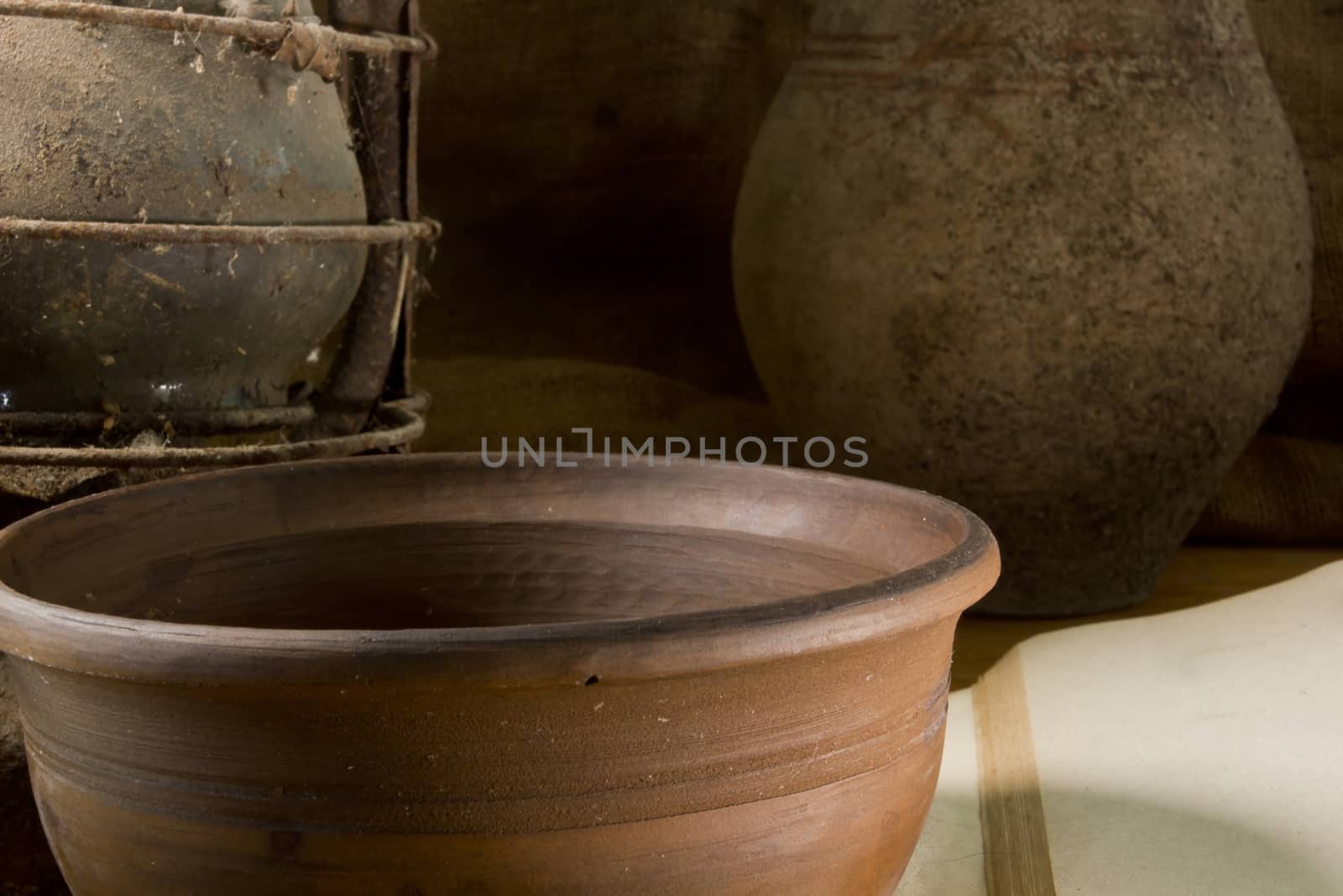 Vintage still life with pottery on an old wooden table