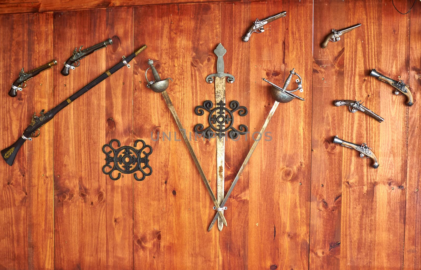 Collection of old antique historical traditional Spanish weapons on display