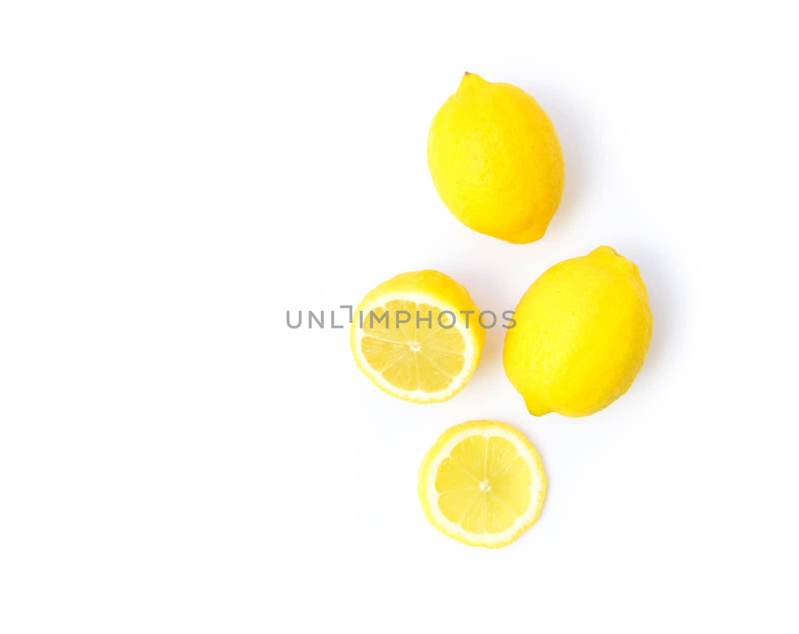 Closeup top view fresh lemon fruit and slice on white background