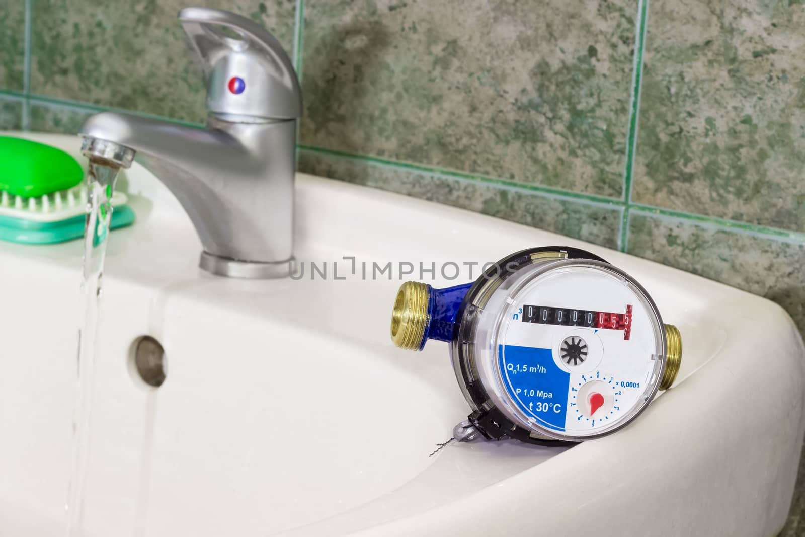 Water meter on the wash basin with handle mixer tap by anmbph