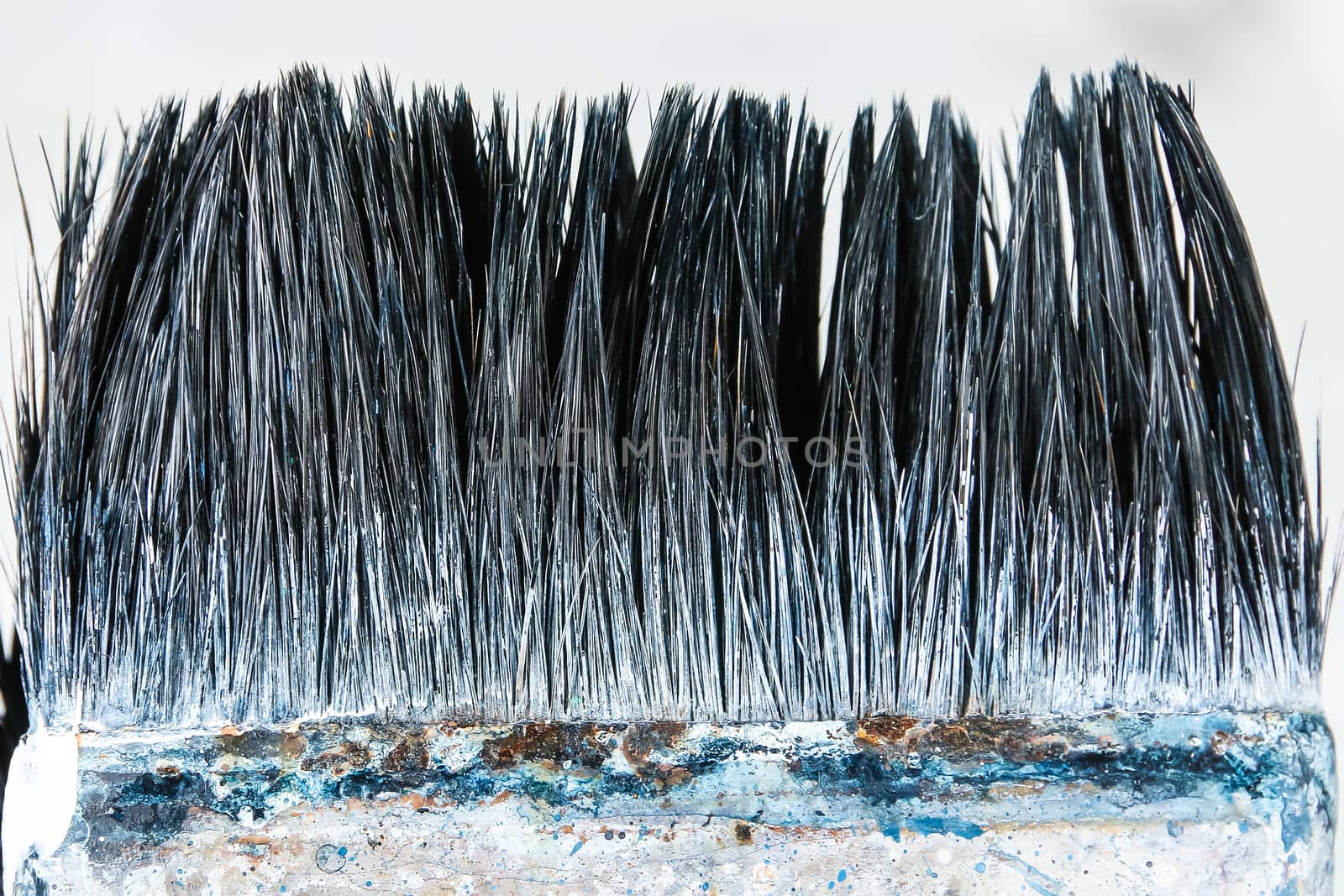 Close up of old paint brushes, grunge and rusty texture background