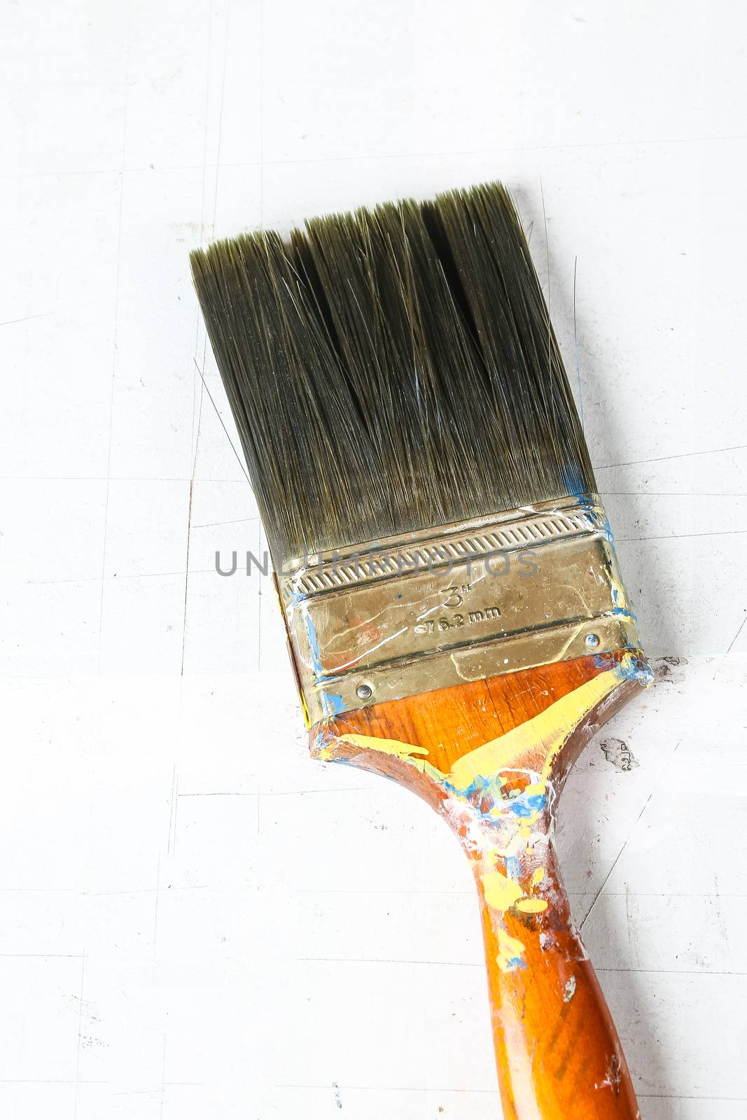 Close up of old paint brushes, grunge and rusty texture background