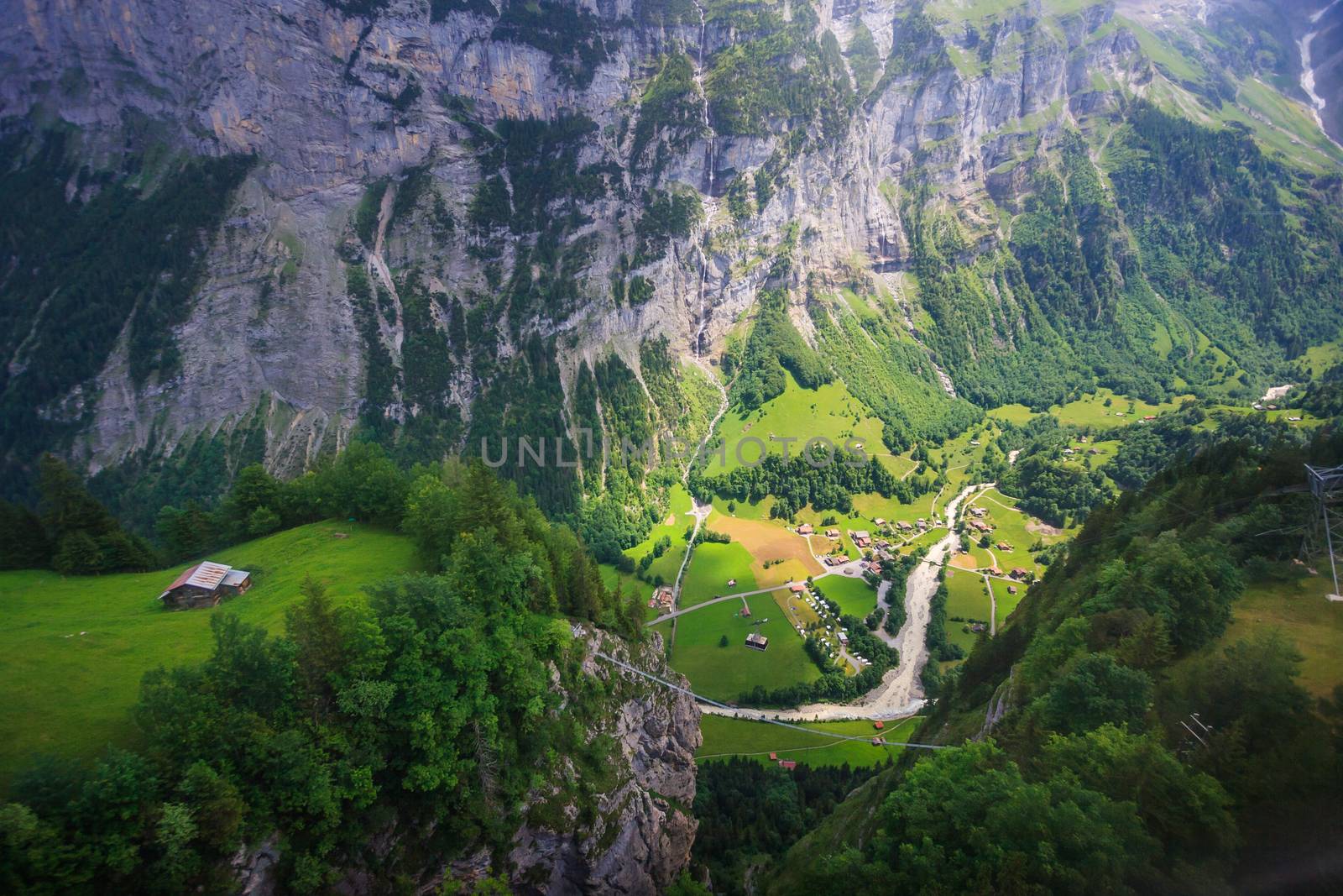 Stunning Lauterbrunnen valley rural view, bird eye view from cable car from Stechelberg to Murren Station, Lauterbrunnen, Bernese Oberland, Switzerland, Europe.