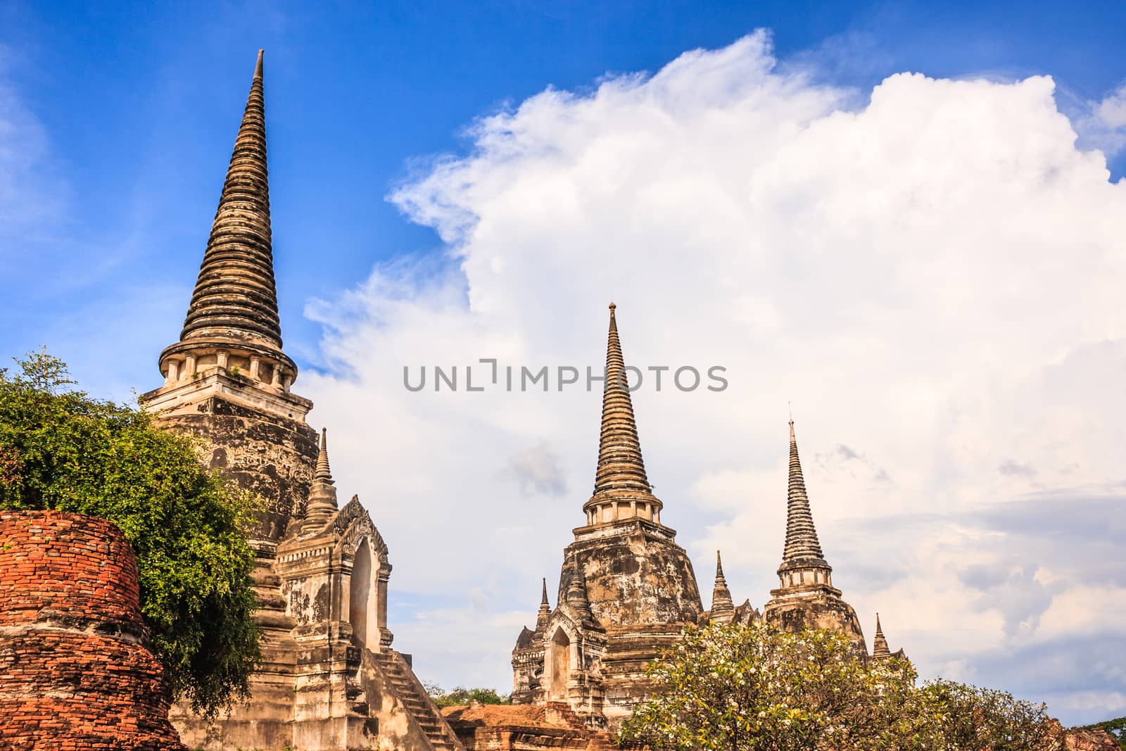 View of asian religious architecture ancient Pagodas in Wat Phra Sri Sanphet Historical Park, Ayuthaya province, Thailand, Southeast Asia. Thailand's top historic landmark, attraction and destination
