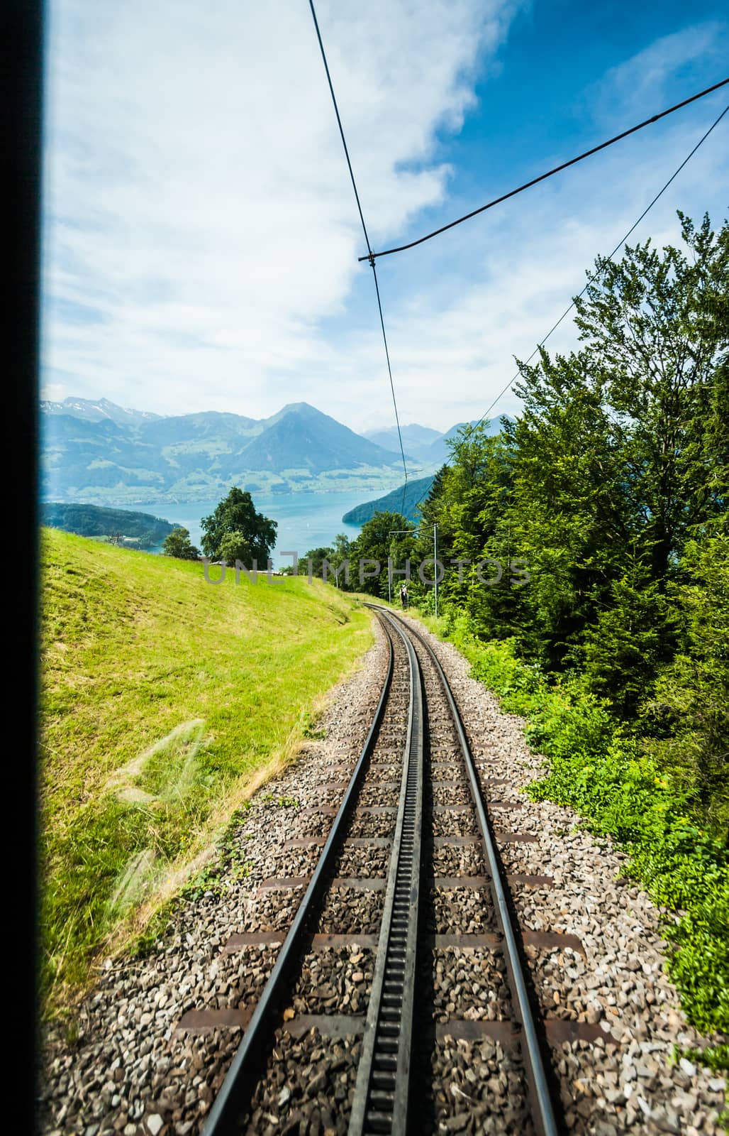 Window View: railway track down Rigi Kulm Station, Lucerne, Switzerland.