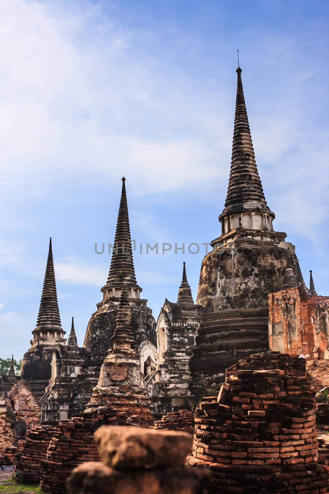 View of asian religious architecture ancient Pagodas in Wat Phra Sri Sanphet Historical Park, Ayuthaya province, Thailand, Southeast Asia. Thailand's top historic landmark, attraction and destination