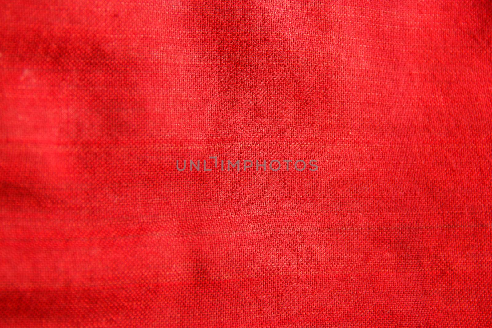 Close-up red traditional fabric cloth texture, textile detail background by victorflowerfly