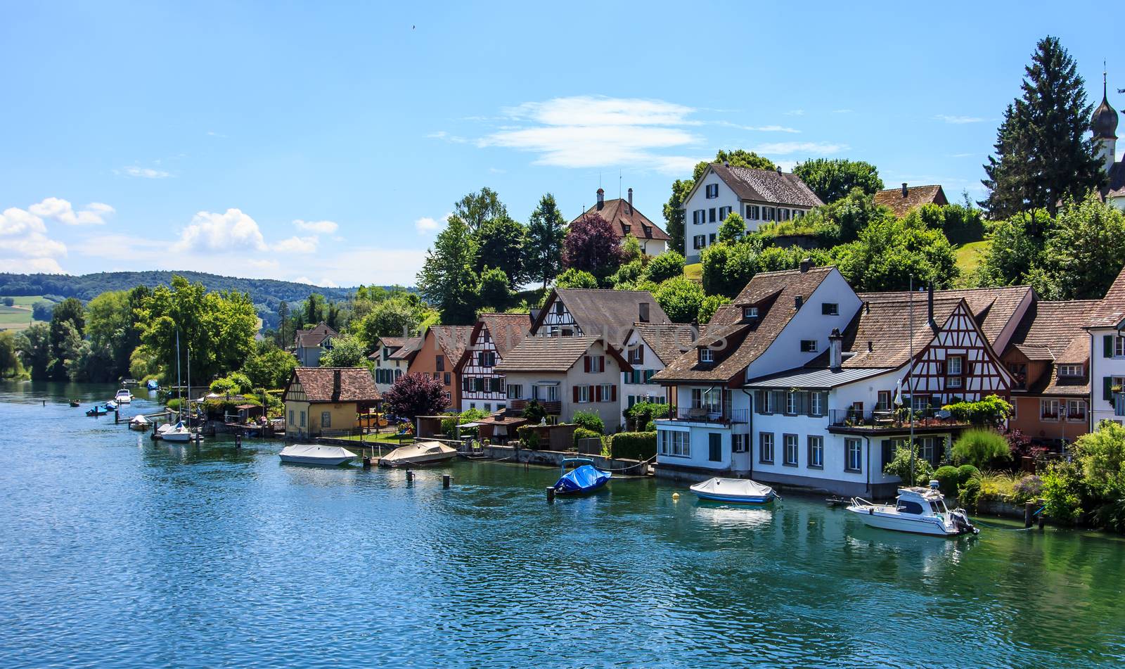 Beautiful panoramic view of Stein Am Rhein town on Rhine River in beauty swiss canton of Schaffhausen, alpine landscape and clear blue sky in warm sunny summer day. by victorflowerfly