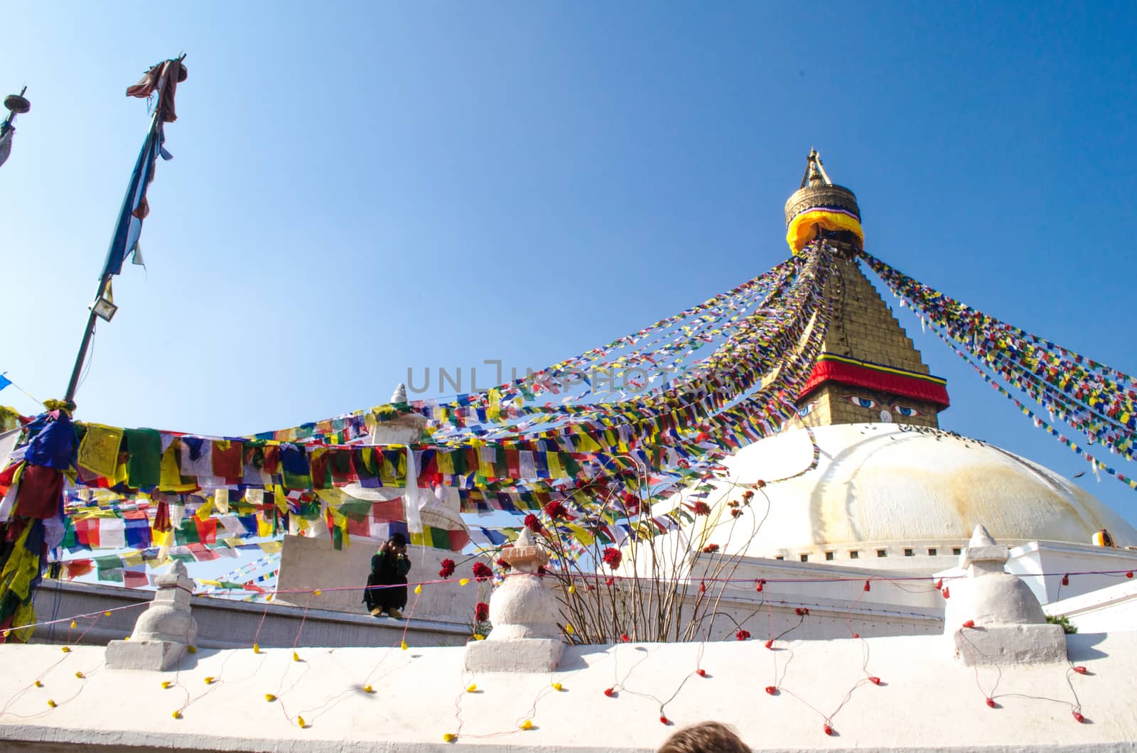 the famous buuha eye gazing out sleepily from each side of the tower are those of the all seeing primordial buddha.perched a top a hill on the western edge of the kathmandu valley.