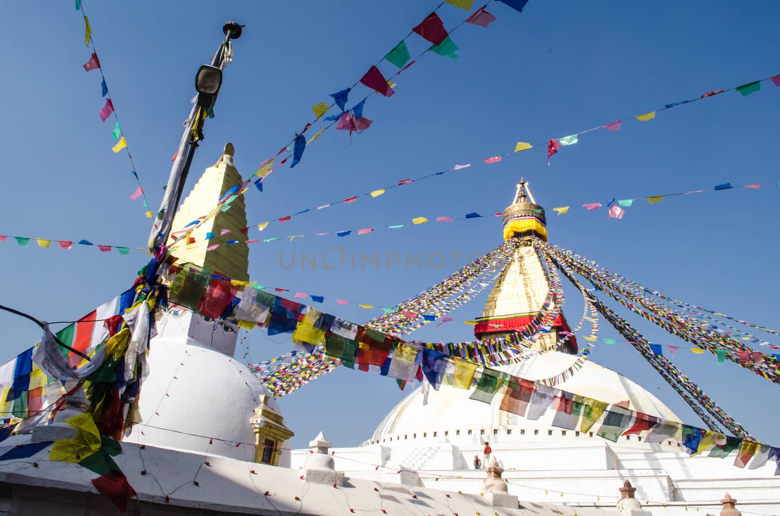 the famous buuha eye gazing out sleepily from each side of the tower are those of the all seeing primordial buddha.perched a top a hill on the western edge of the kathmandu valley.