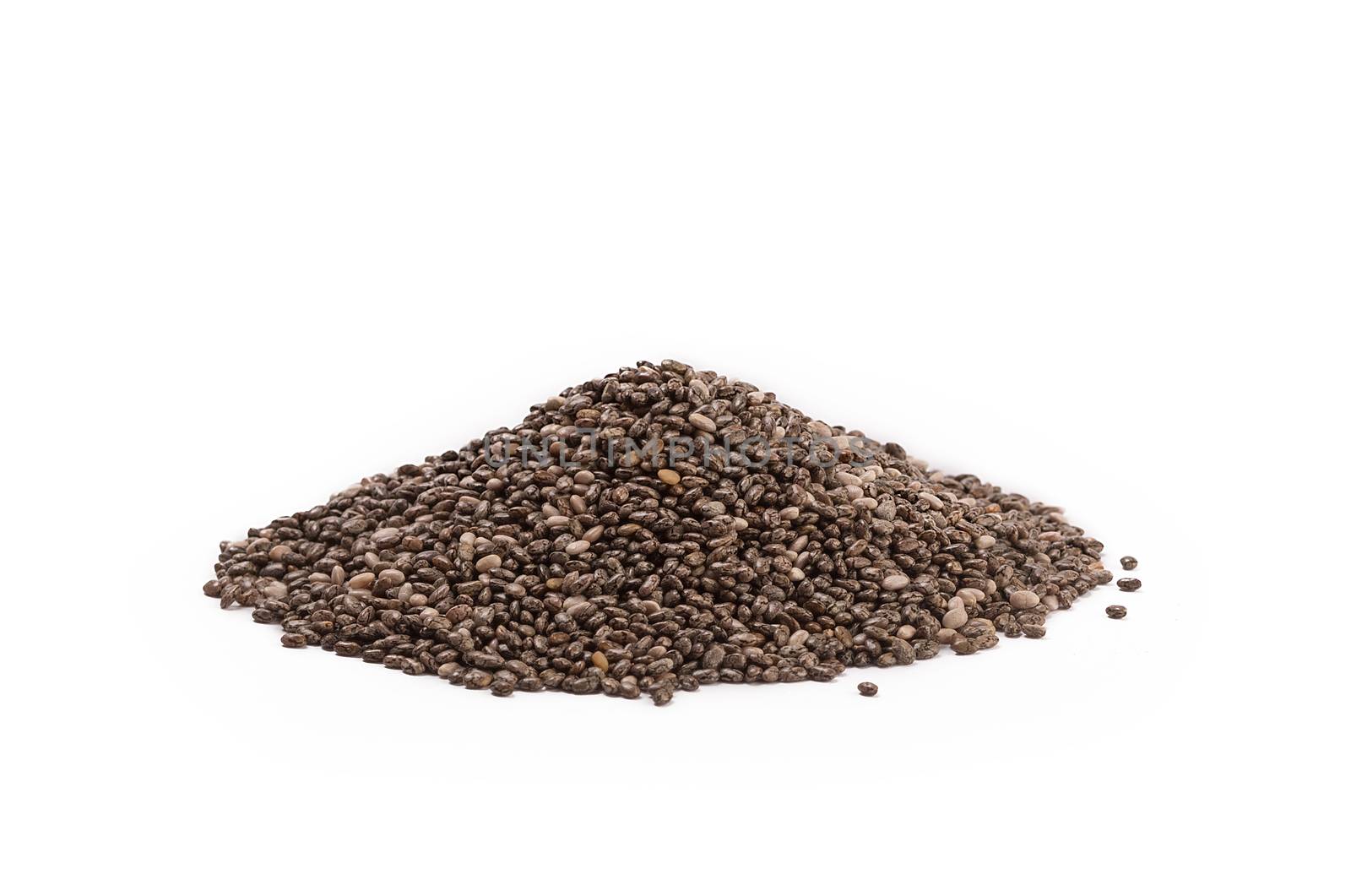 a heap of organic chia seeds rich in omega-3 fatty acids, side view on white