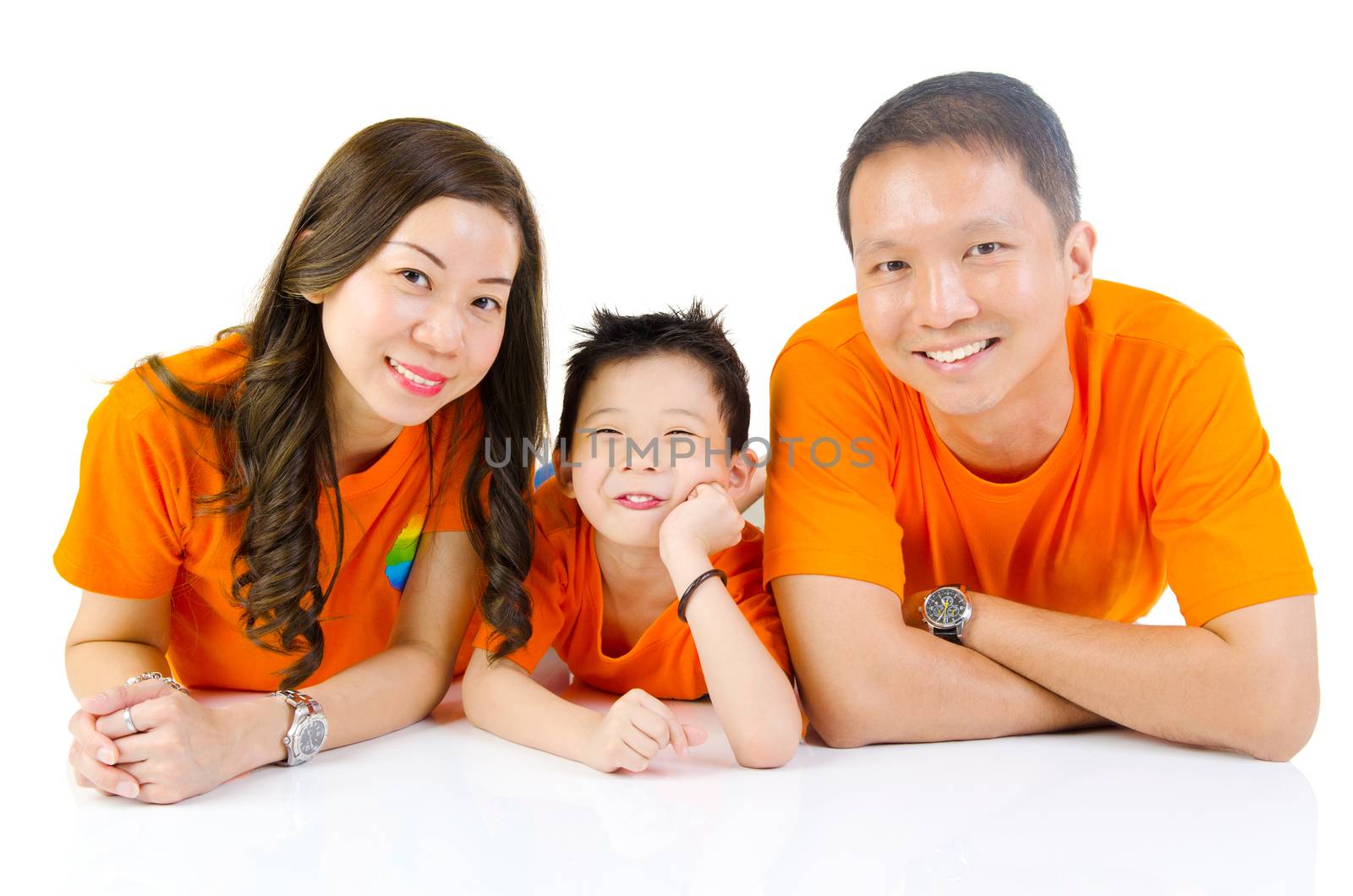 Indoor portrait of asian family at home