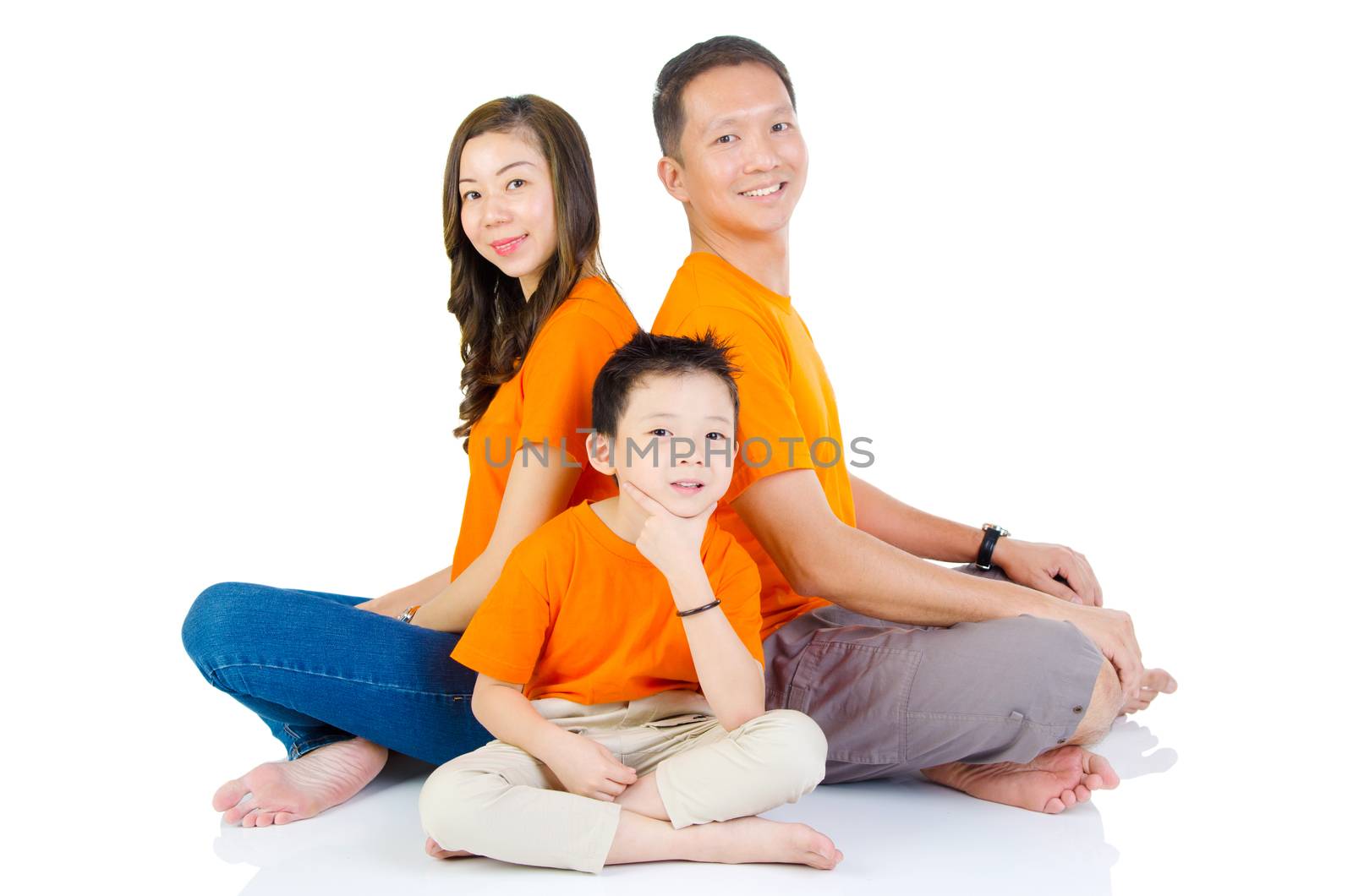 Indoor portrait of asian family at home