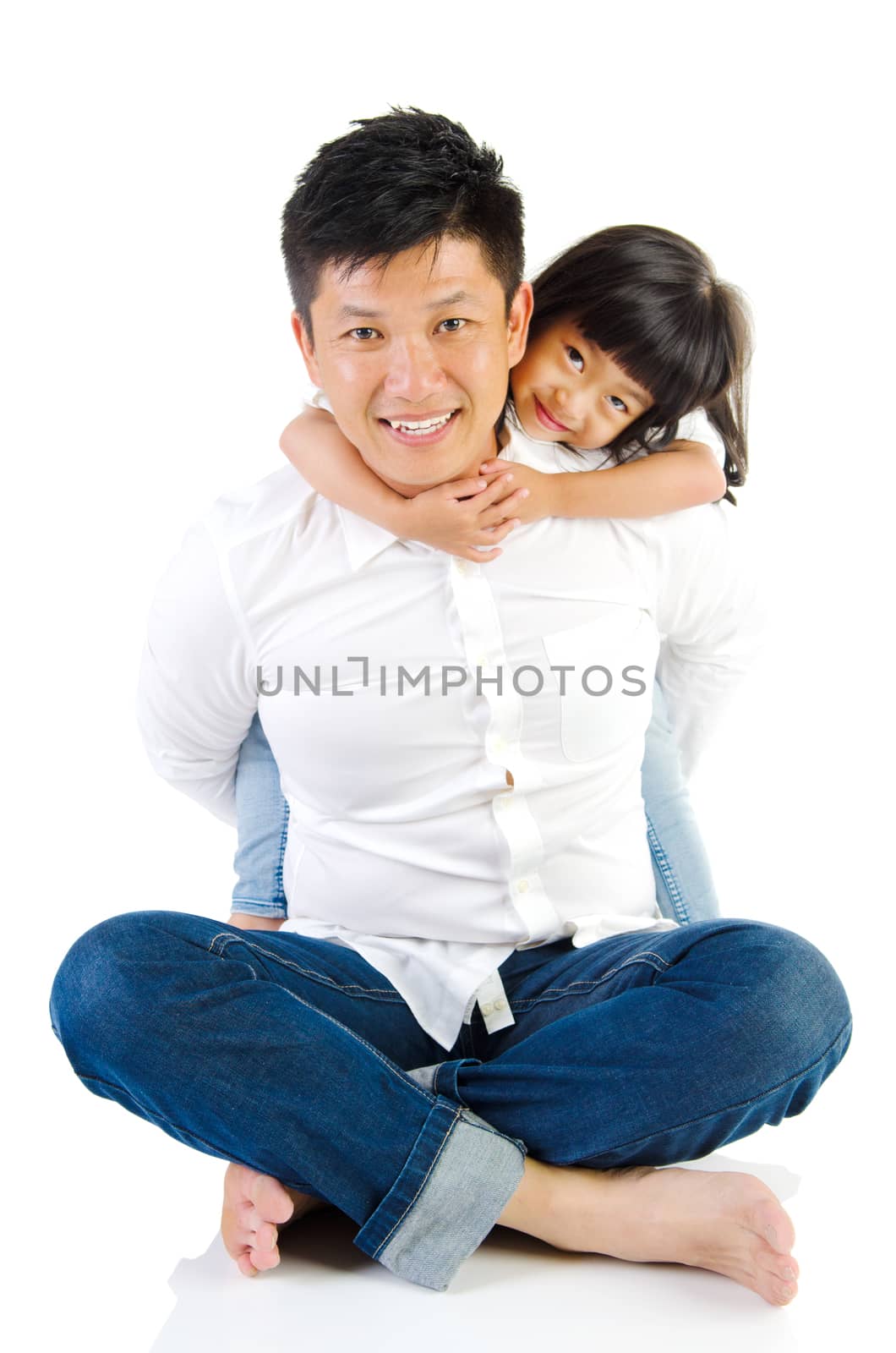 Asian father and his cute little girl isolated on white background