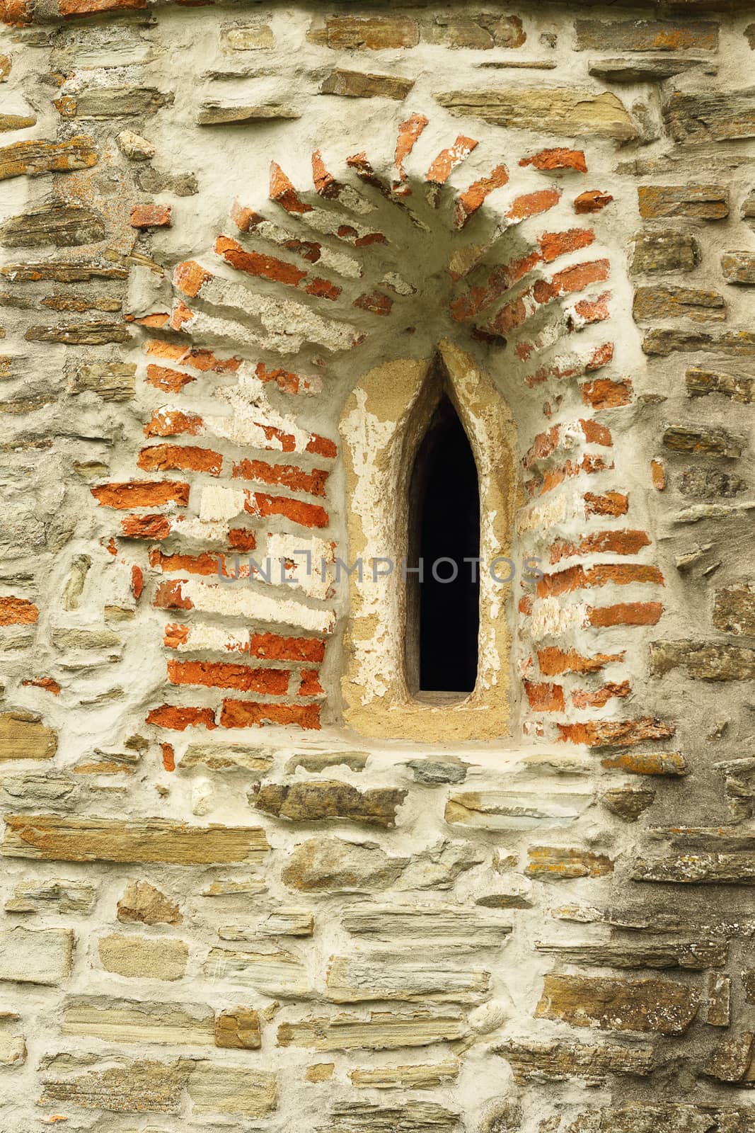 gothic church window detail on old abandoned historical building