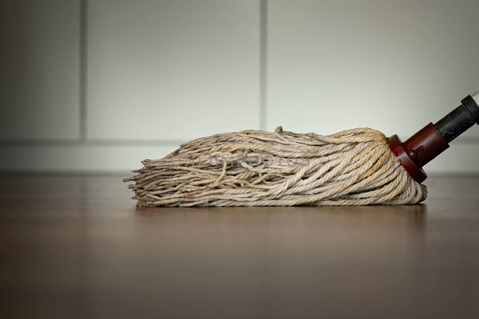 cleaning surface, mop on wooden floor