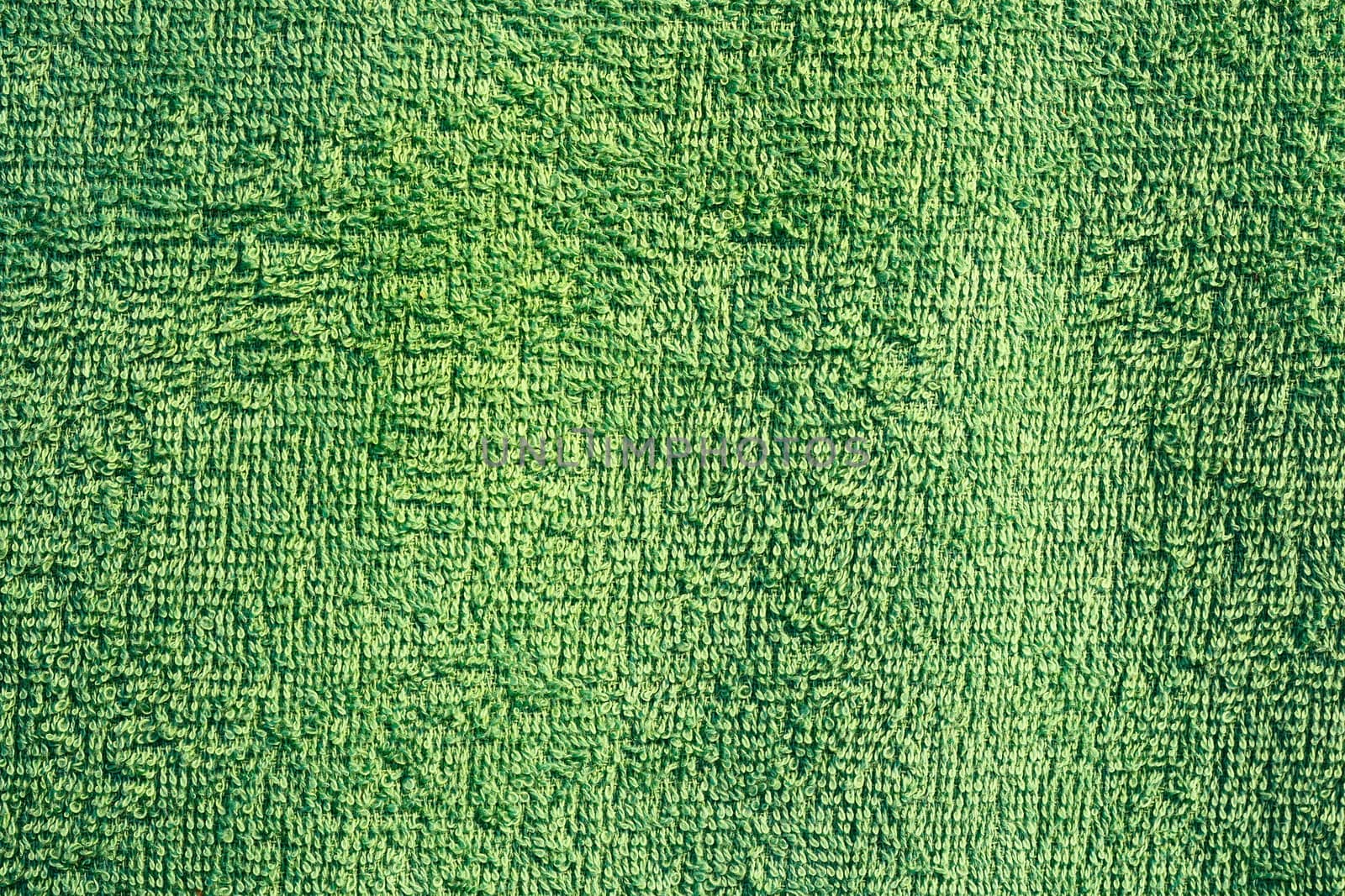 green texture of a fluffy towel