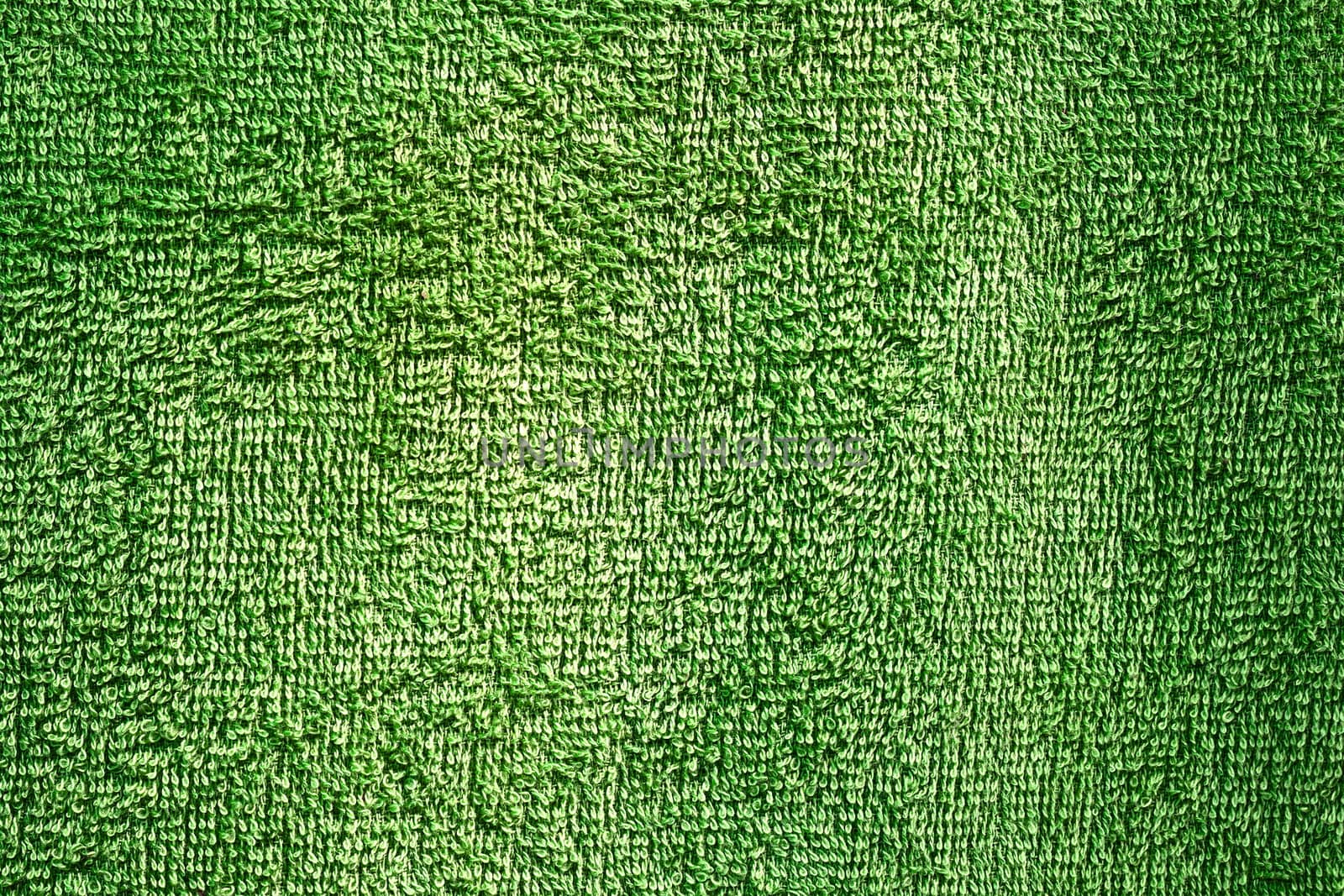 green texture on towel material by taviphoto