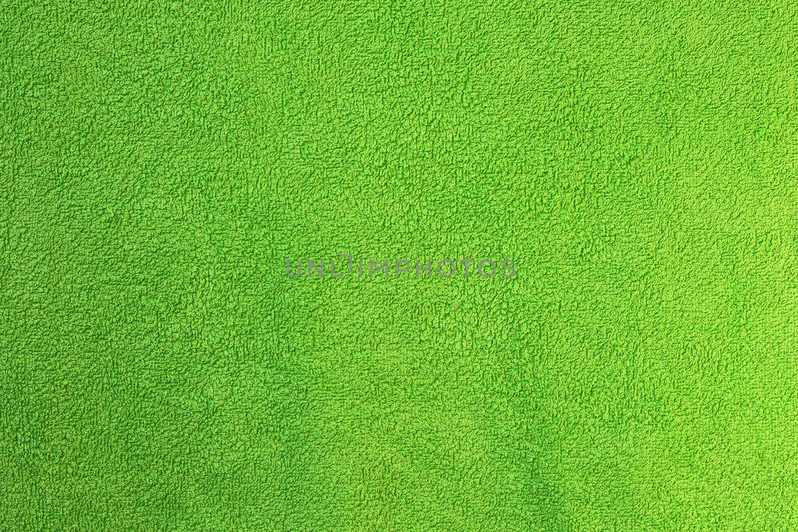 green towel textural surface by taviphoto