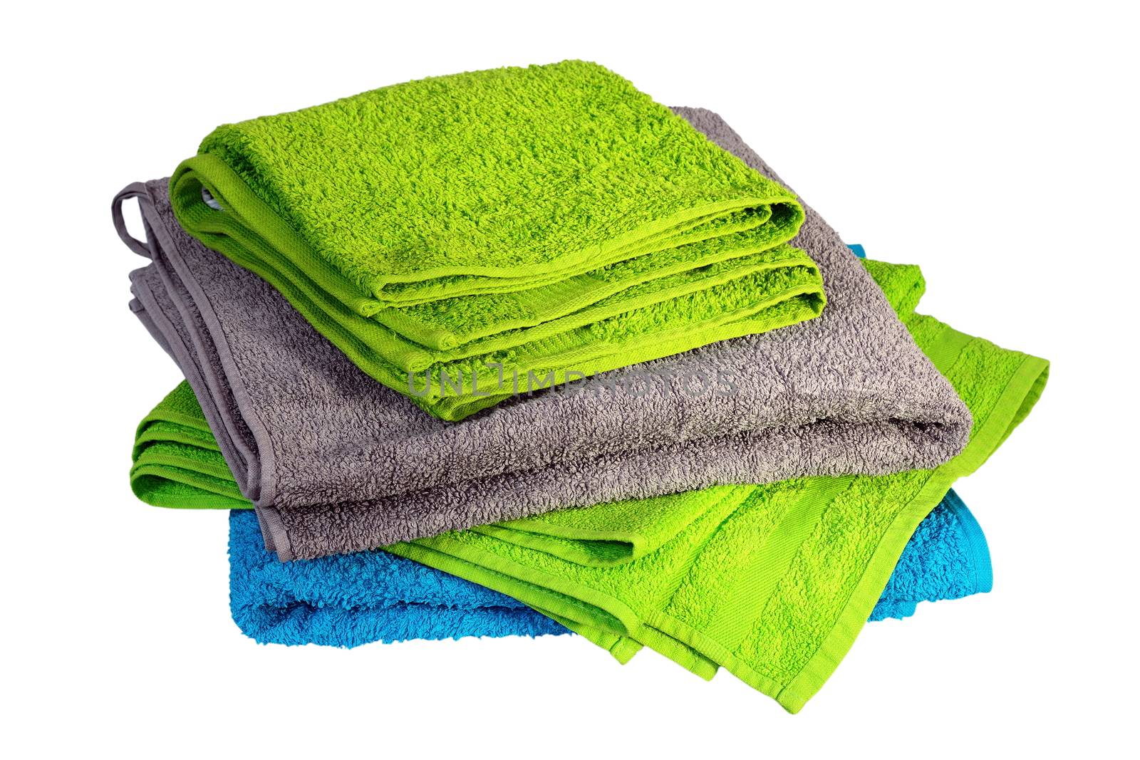 stack of colorful towels isolated over white background