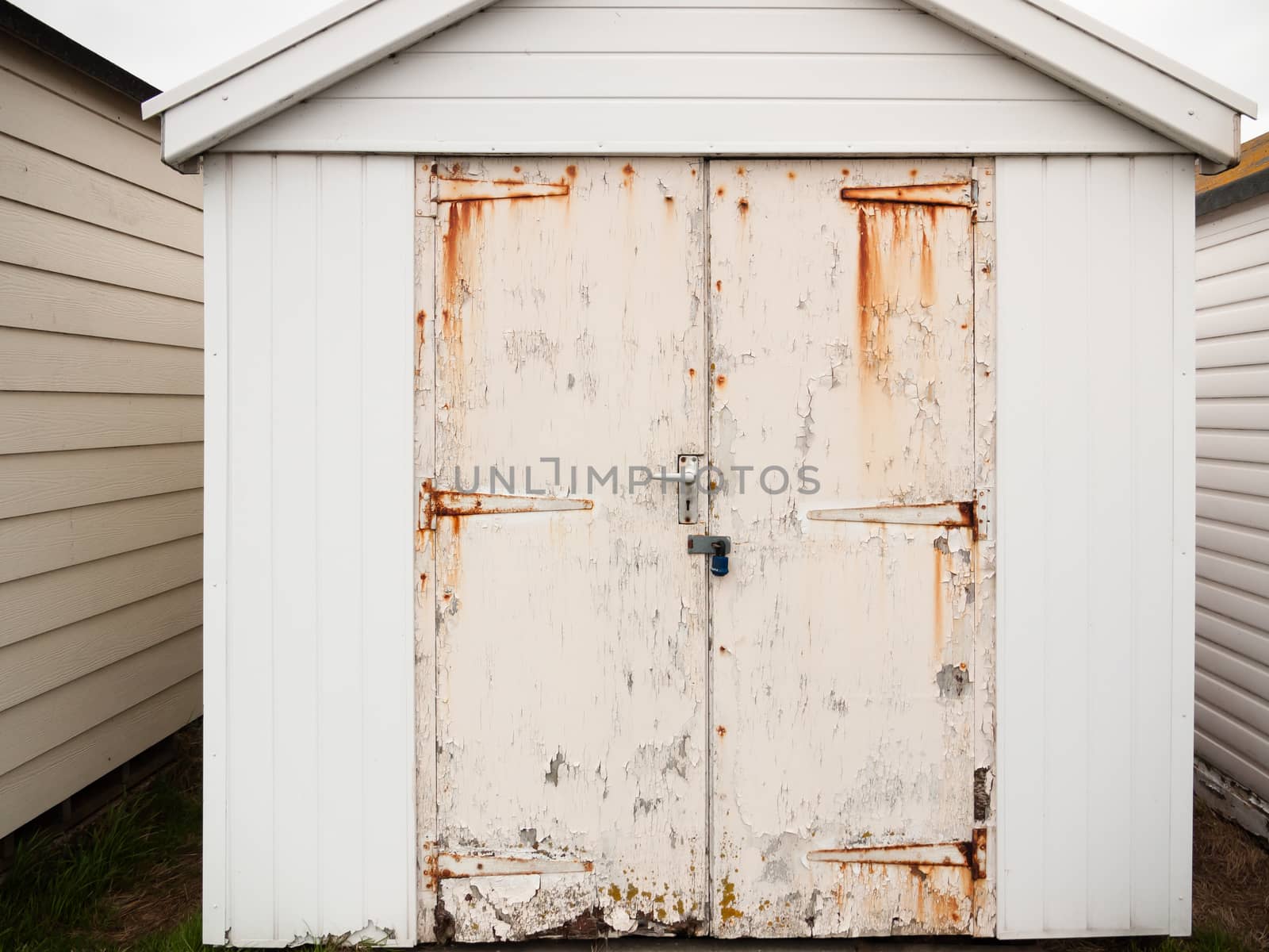 close up of shed door white rusted grunge dirty; England; UK