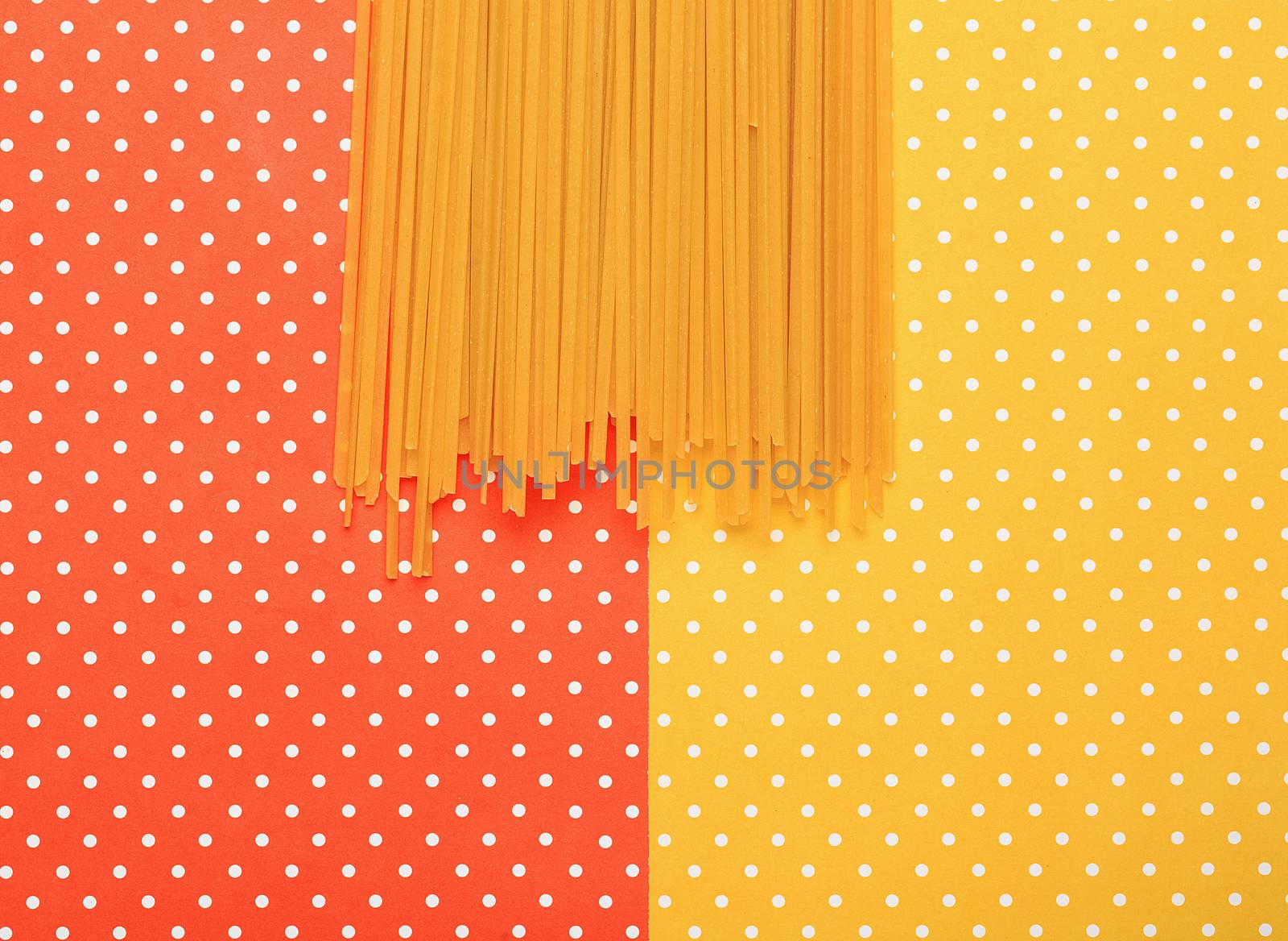 Spaghetti with colorful topped background