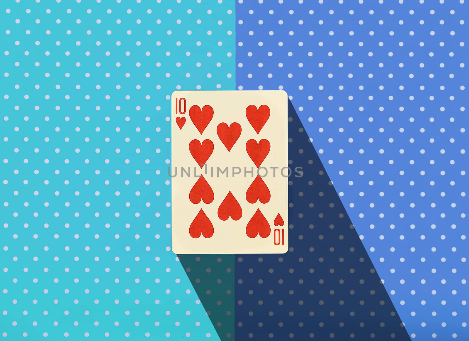 Playing cards with colorful topped background
