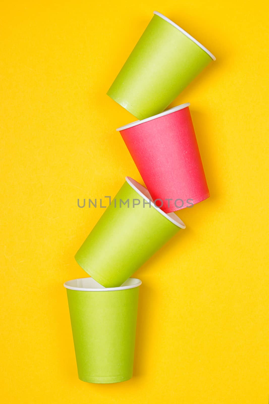 Stacks of pink paper cups by victosha