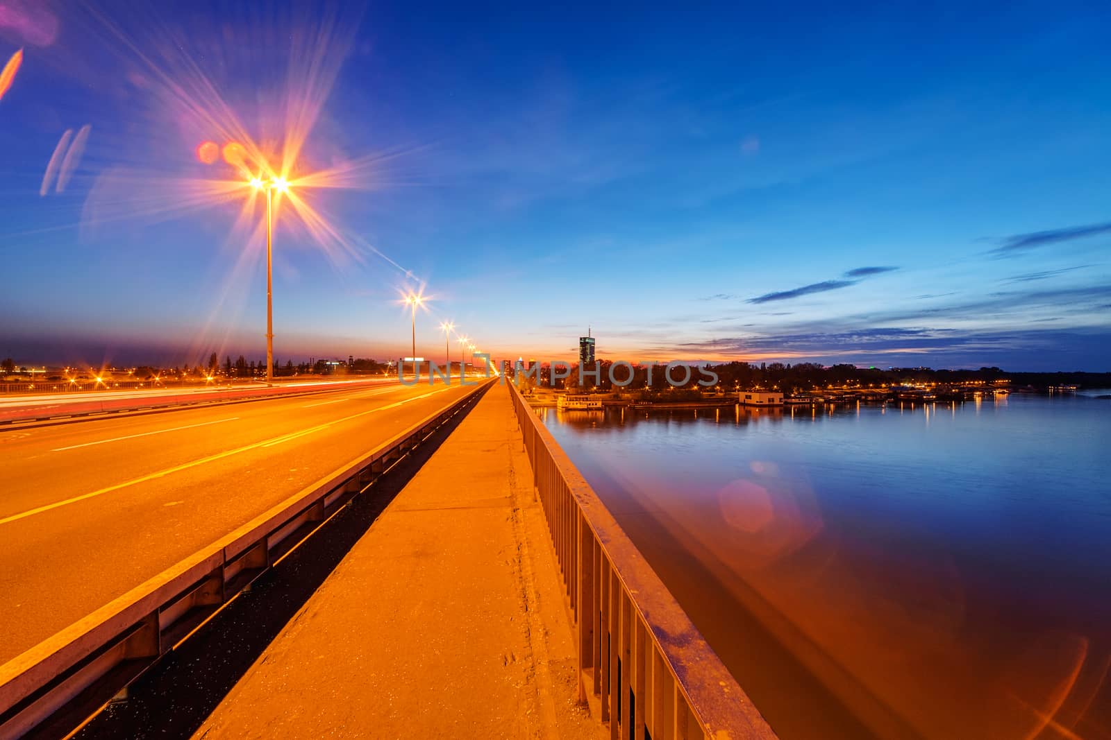 Bridge across river at night with artificial lightning, Belgrade Serbia