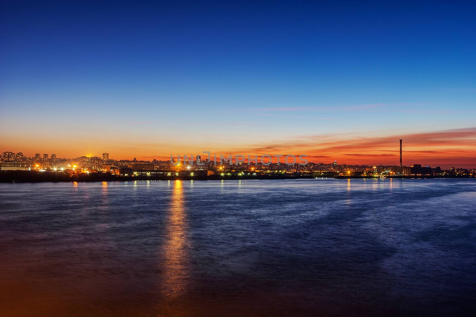 Panorama of Belgrade at night with river Danube