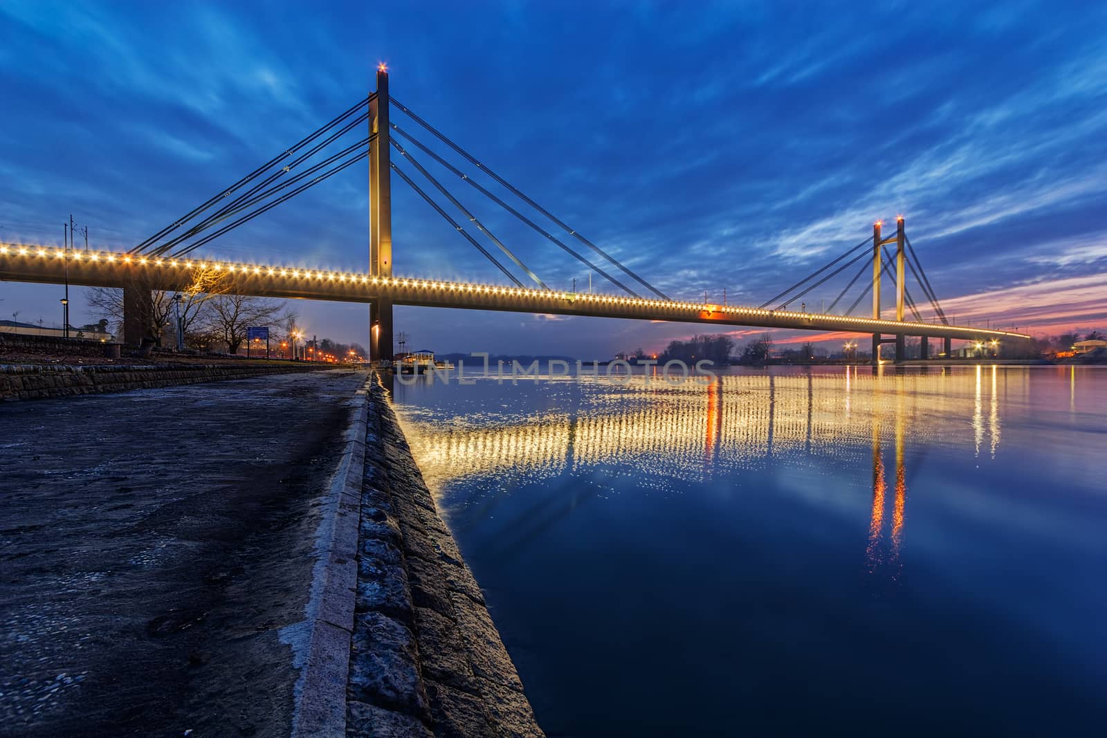 Bridge across river at night with artificial lightning, Belgrade Serbia