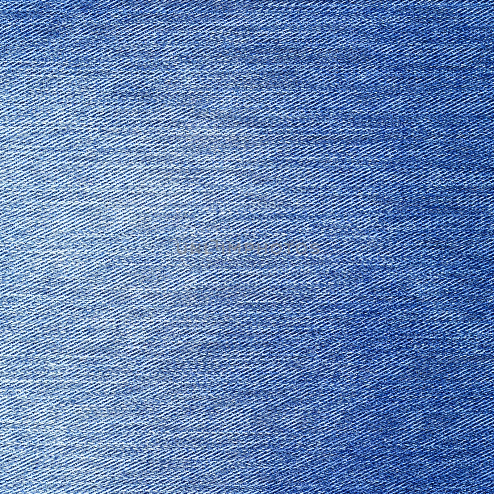 Denim texture. Light blue jeans background by ESSL