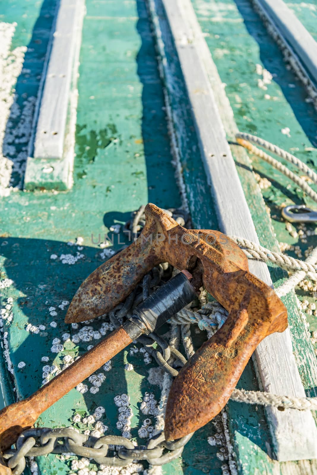 Close-up of rusted anchor on a boat in Maine