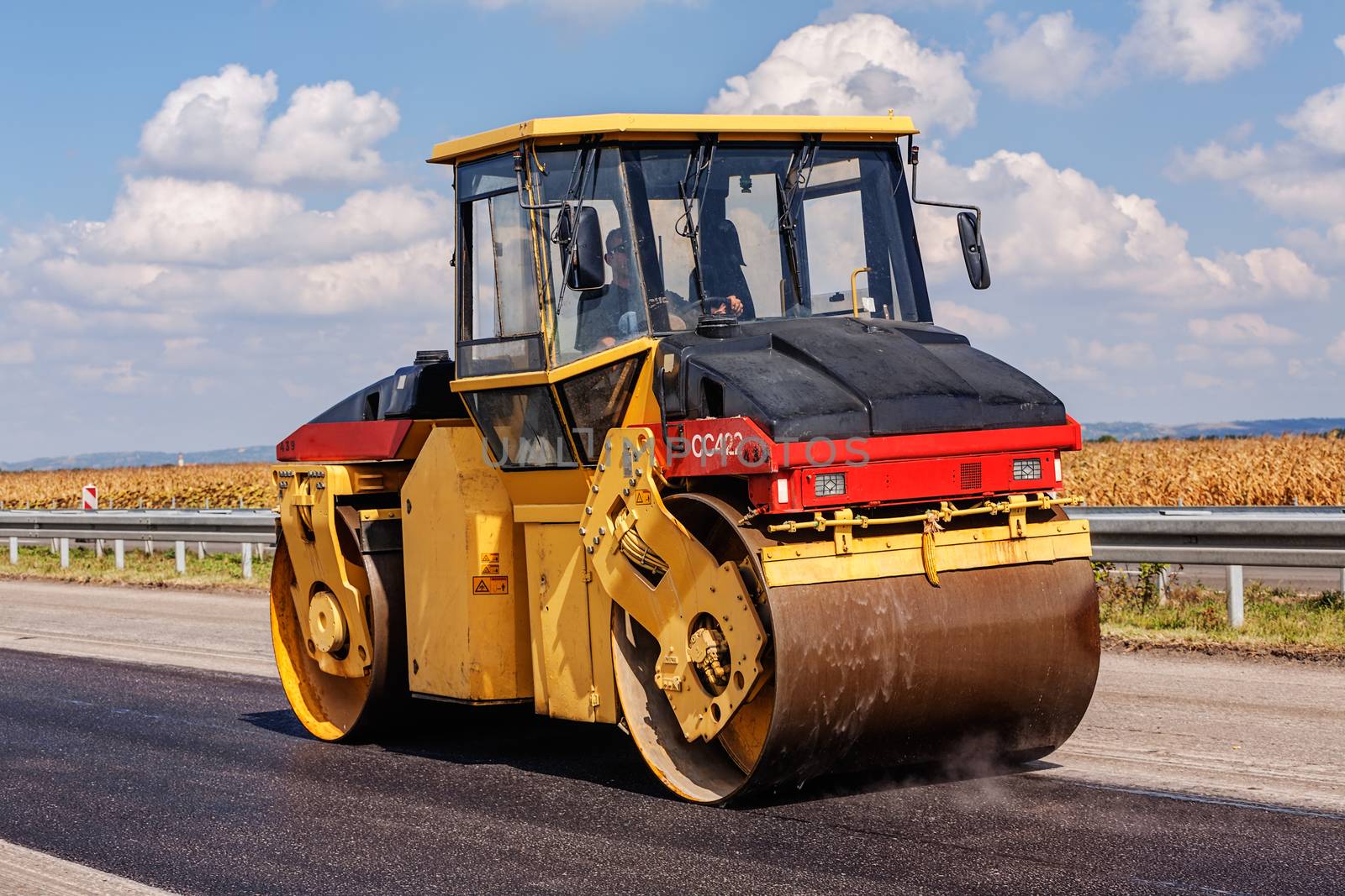 Road making with heavy machines