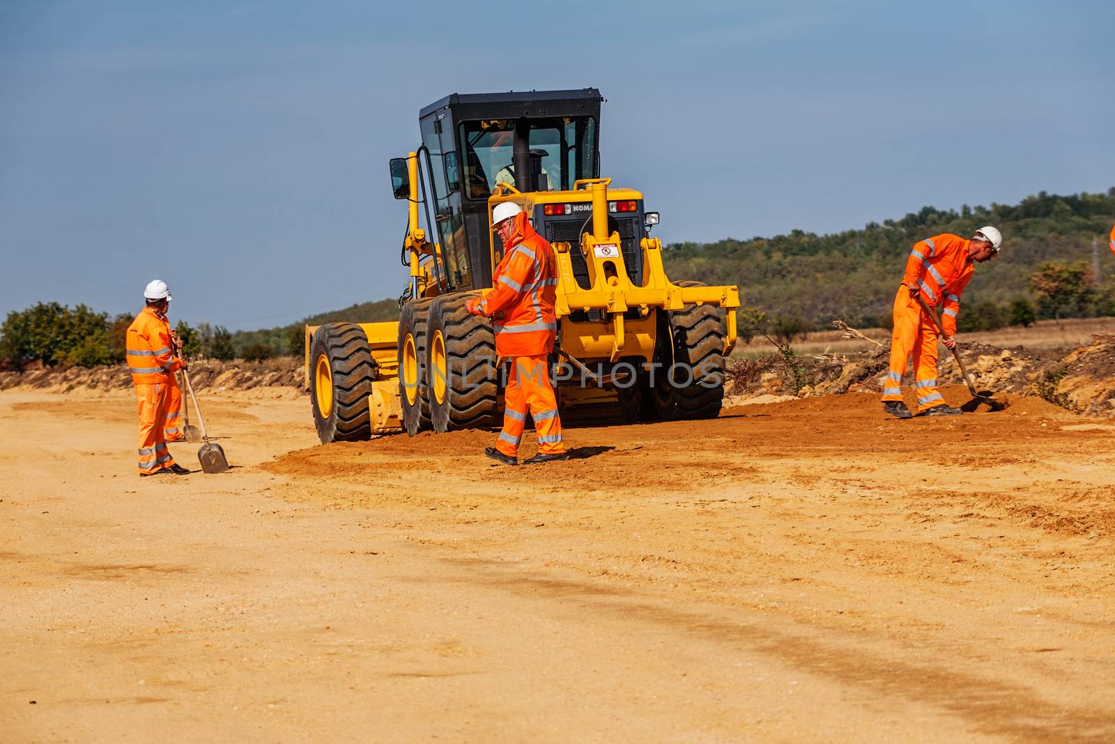 Road making with heavy machines