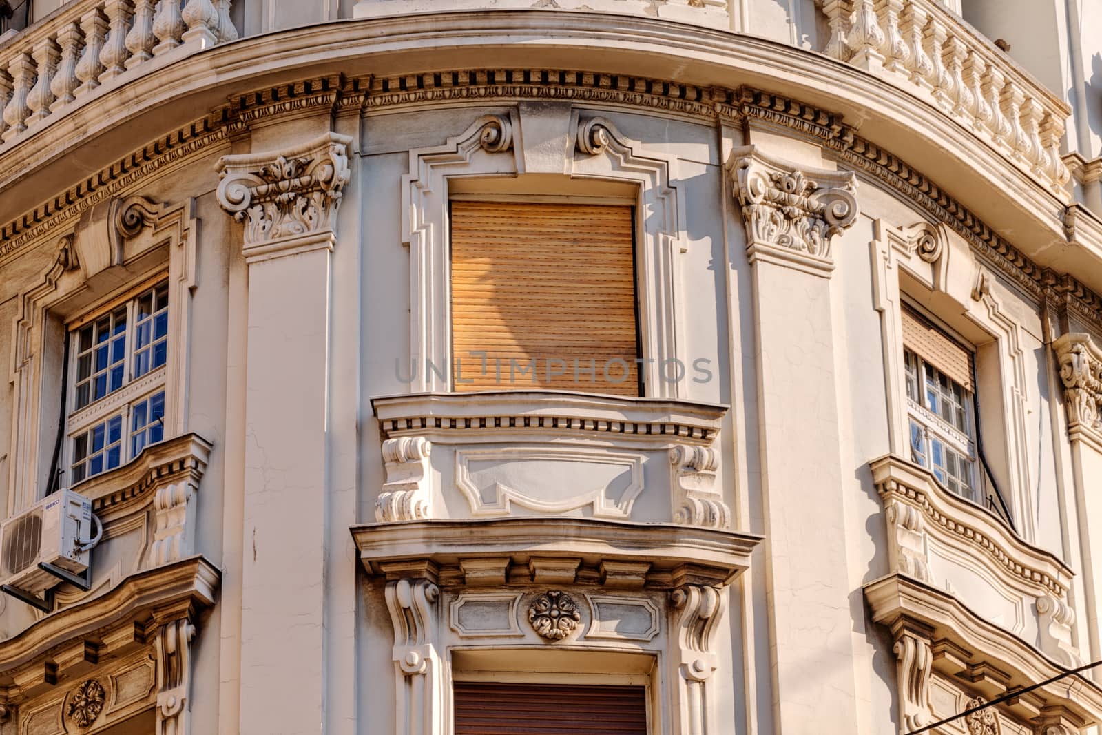 stone facade on classical building with ornaments and sculptures