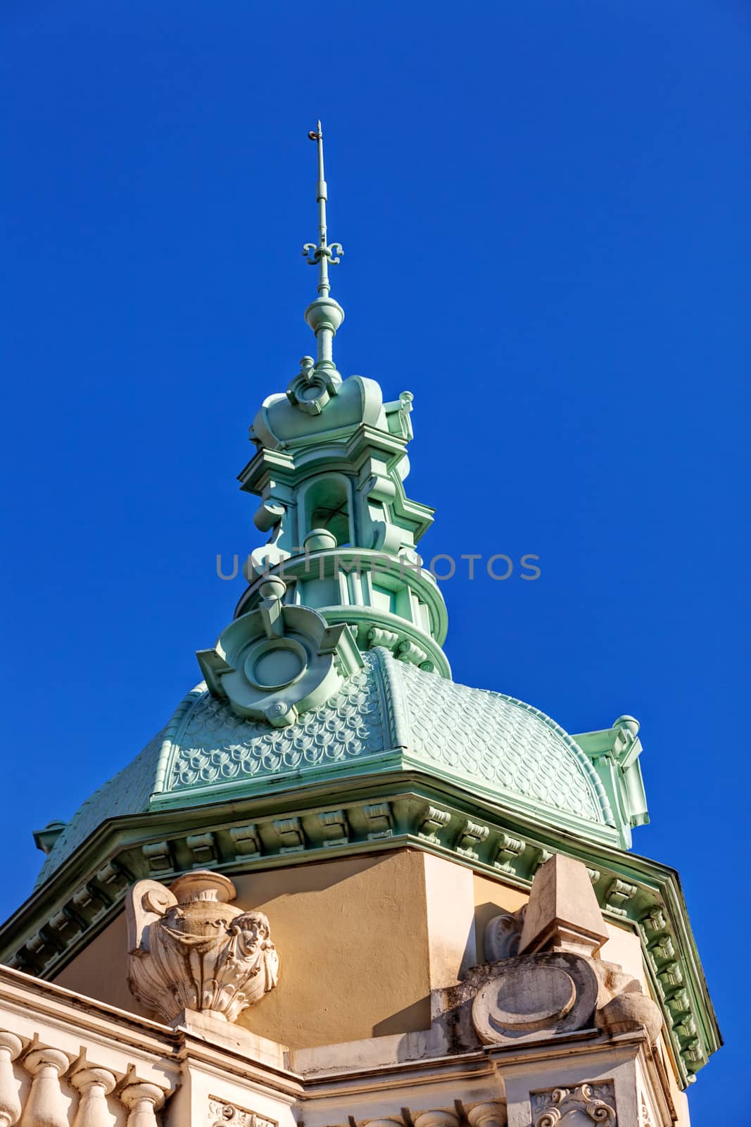 Stone facade on classical building with ornaments and sculptures