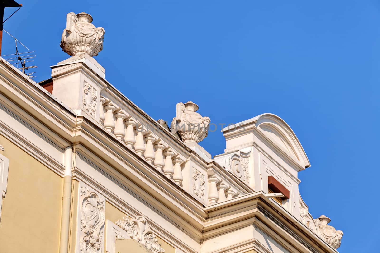 stone facade on classical building with ornaments and sculptures