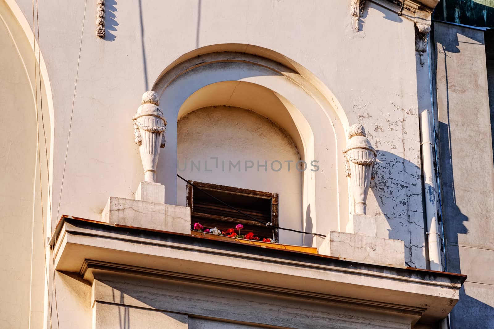 stone facade on classical building with ornaments and sculptures