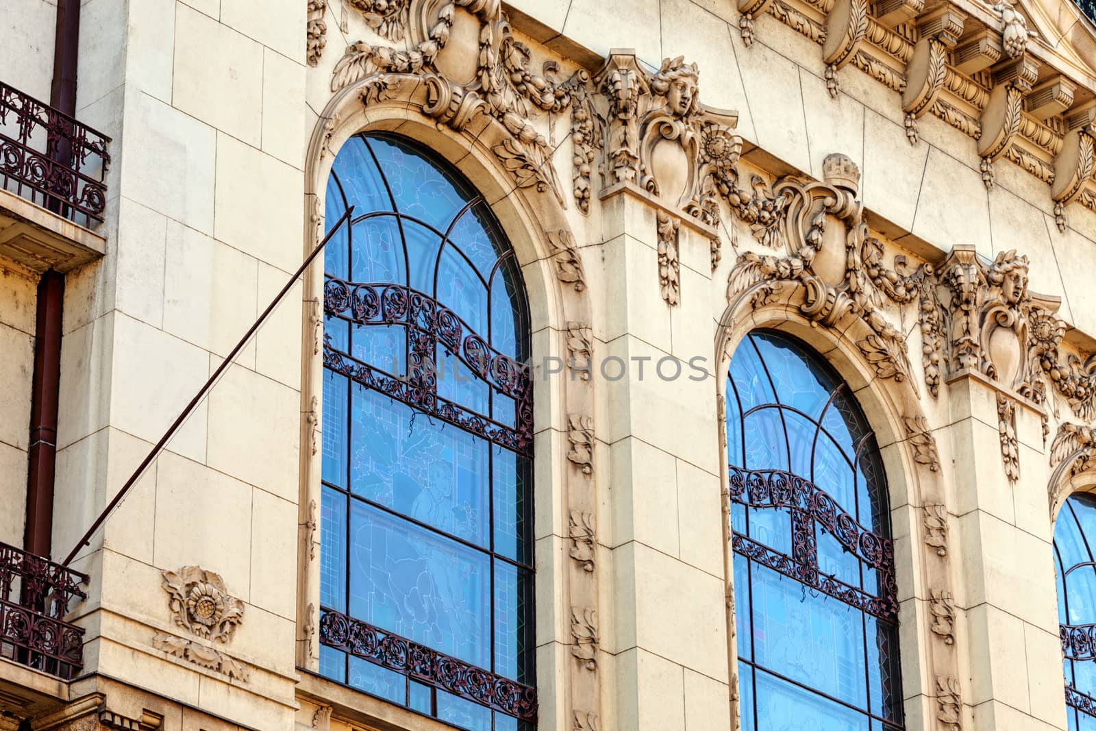 stone facade on classical building with ornaments and sculptures