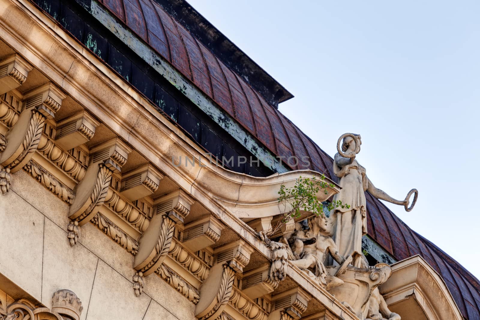 stone facade on classical building with ornaments and sculptures