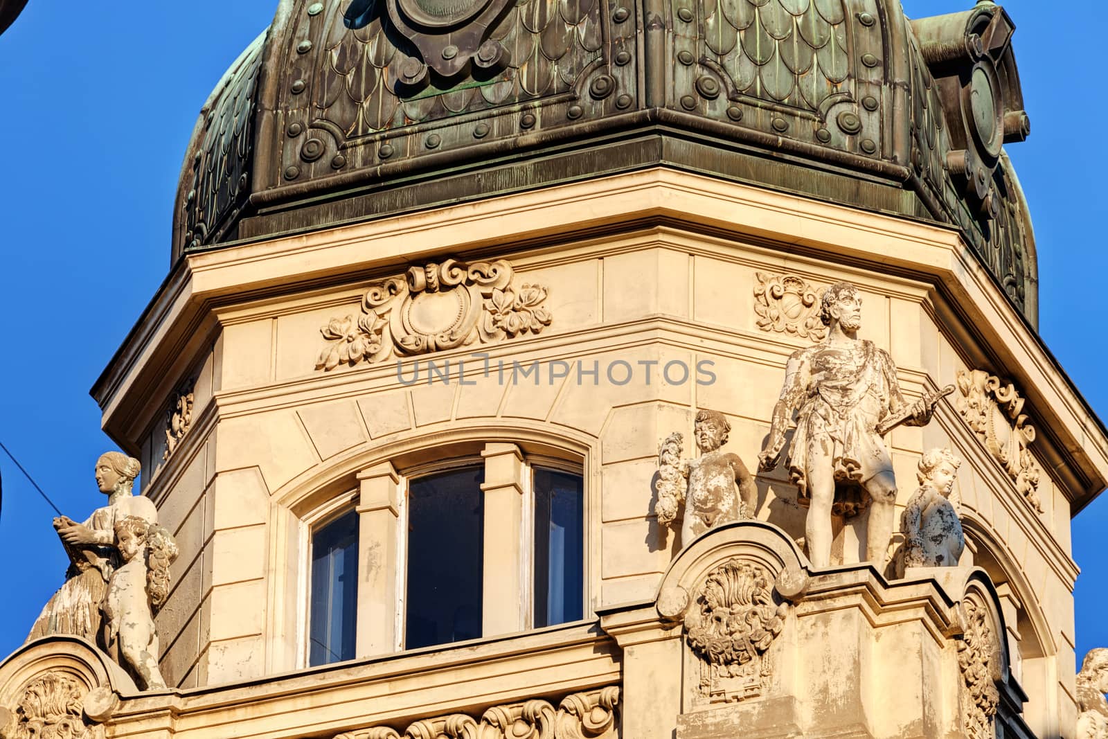 stone facade on classical building with ornaments and sculptures