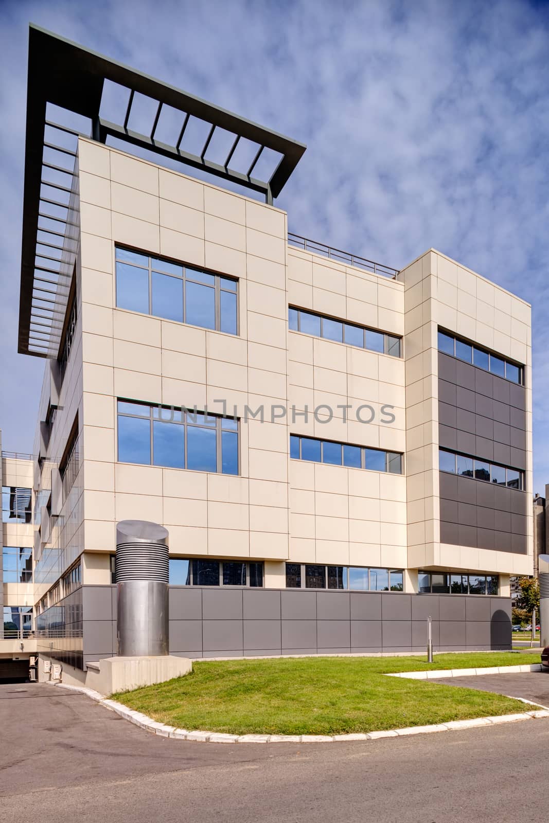 Modern building exterior with glass and metallic facade