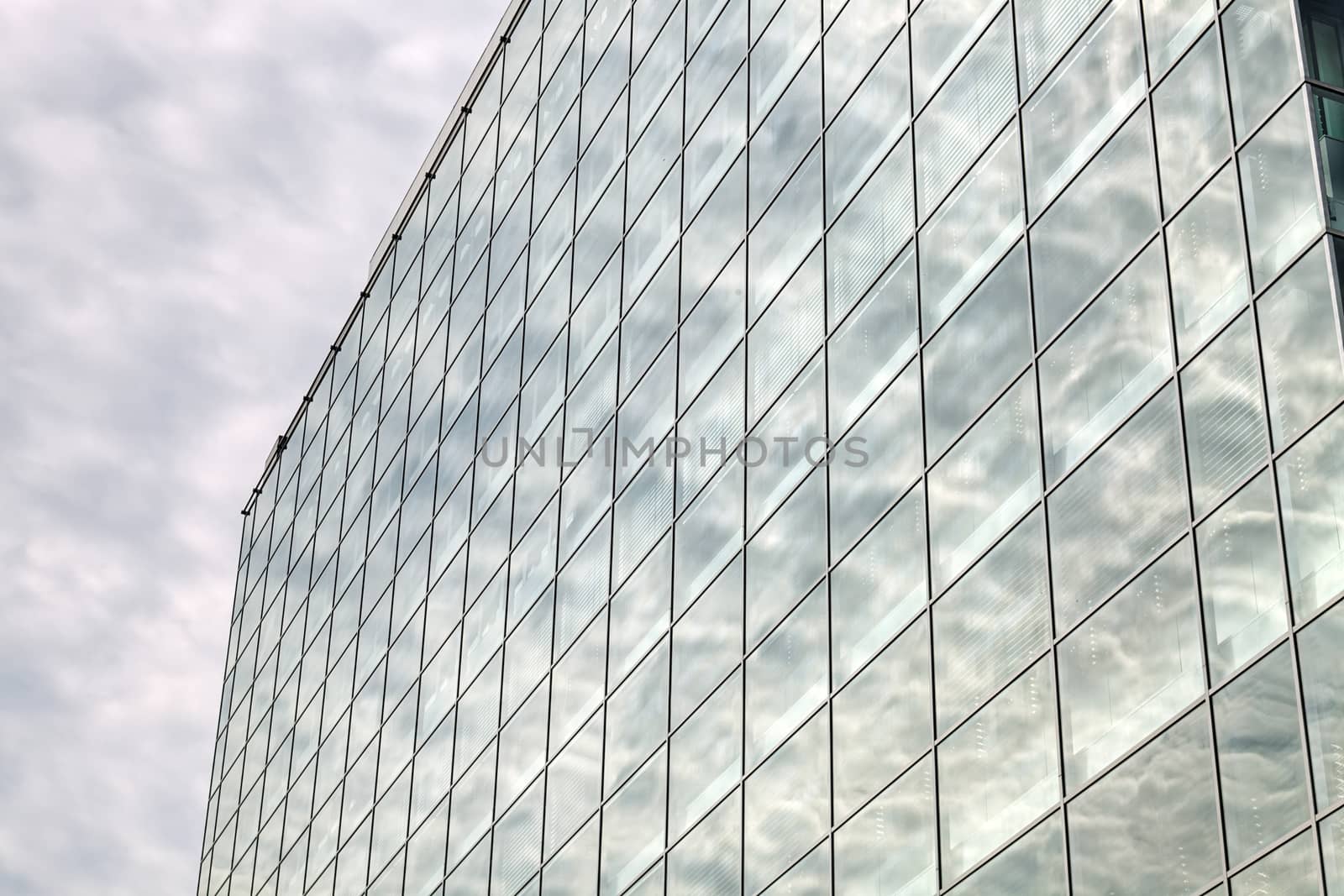 Detail of modern building  glass facade with reflections